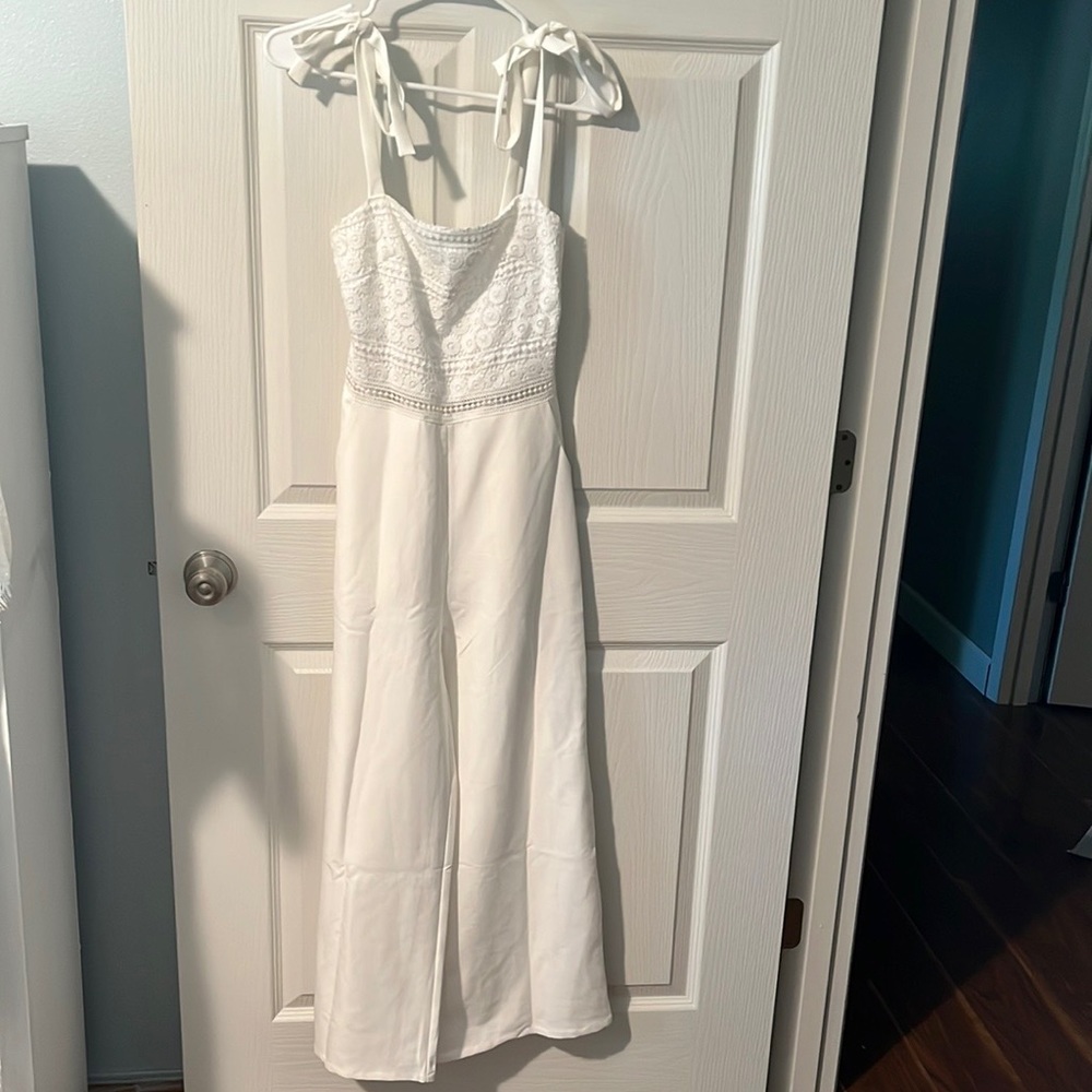 Jaus white lace jumpsuit. Size 4. New with tags.